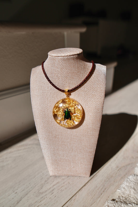 The Beetle Behind the Pendant