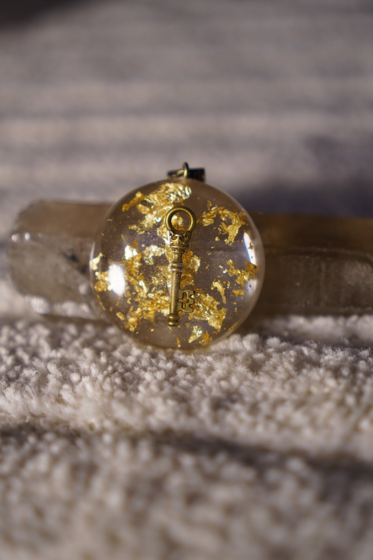 Beautifully Flawed Bronze Key Pendant, handmade by Aura Pendants